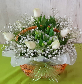 12 White roses in a Basket 
