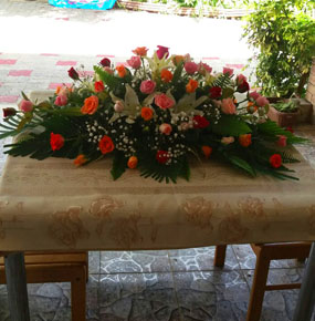 Orange Roses Casket Spray