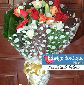  Gerberas, lilies and colourful roses 